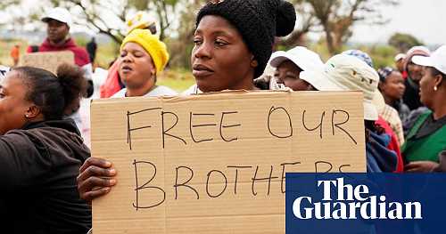 ‘I can’t lose hope’: families await news of trapped miners in South Africa